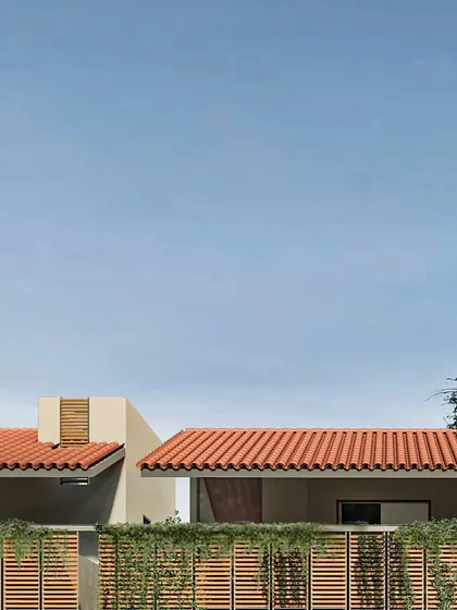 A wider view of the street elevation, showing a row of homes with a unified architectural language.