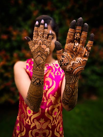 A fun pose showing both the front and back of the hands, demonstrating two different but complementary styles.