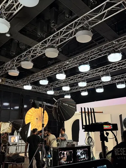 The Limelight set during setup, showing the crew positioning cameras and talent under our pre-rigged lighting grid.