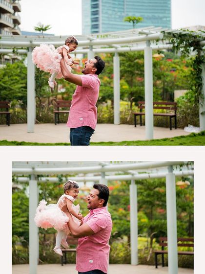 A father and daughter playing together in a park, a perfect example of the joyful, lifestyle photos we love to create.