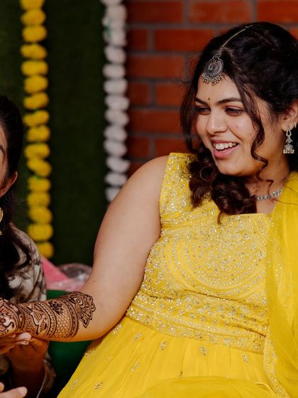 A candid moment of laughter and joy at a mehendi party. It's wonderful to be a part of such happy celebrations.