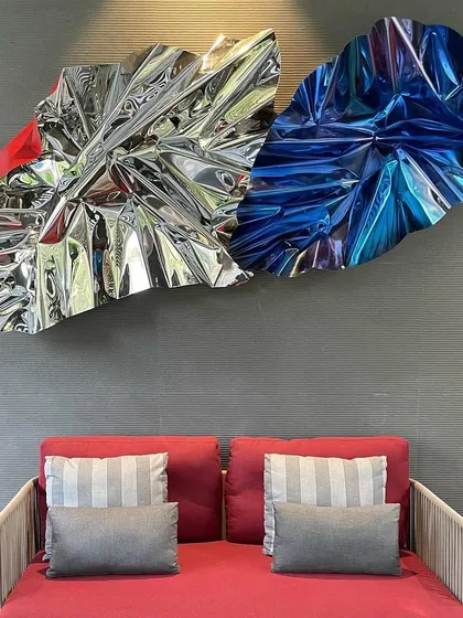 "Meteor 89," a large-scale installation for a client, combines electric blue, reflective silver, and a hint of red for a truly unique composition.