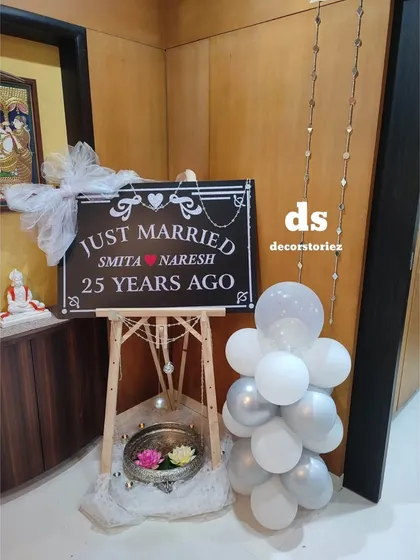 We provide custom signage for events, like this personalized chalkboard-style sign for a 25th anniversary. It's a wonderful way to welcome guests and add a personal touch to the celebration.