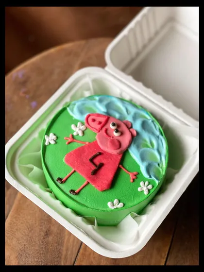 A custom Peppa Pig bento cake for a little one's 4th birthday. Even my small cakes can be themed for your child's favorite character.