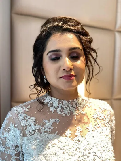 A close-up of the Christian bride's eye makeup. A soft, shimmery look that is both romantic and elegant.