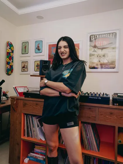 A more relaxed moment in my home studio. You can see my Pioneer DJ controller and some of the art that inspires me, creating a space that's all about good energy and creativity.