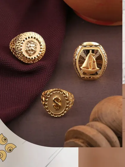 A collection of our statement gold rings for men. Featuring bold designs like a lion's head, a ship, and a dollar sign, these rings are crafted to appeal to a variety of tastes.