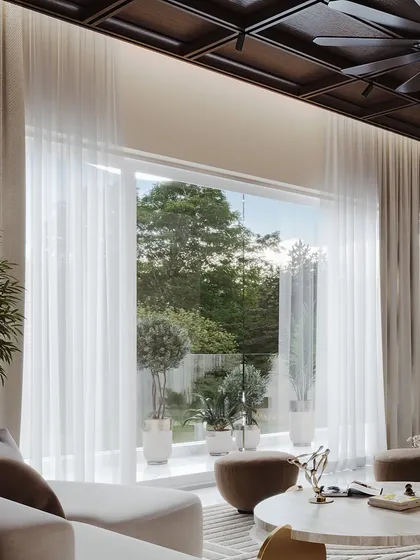 This view emphasizes the connection to the outdoors, with sheer curtains framing a lush garden. My rendering shows how the interior space is flooded with soft, natural daylight.