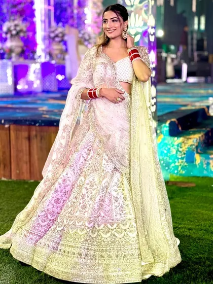 We were thrilled to help this influencer with a last-minute lehenga request. She looks stunning in this ivory piece with subtle multi-color threadwork.