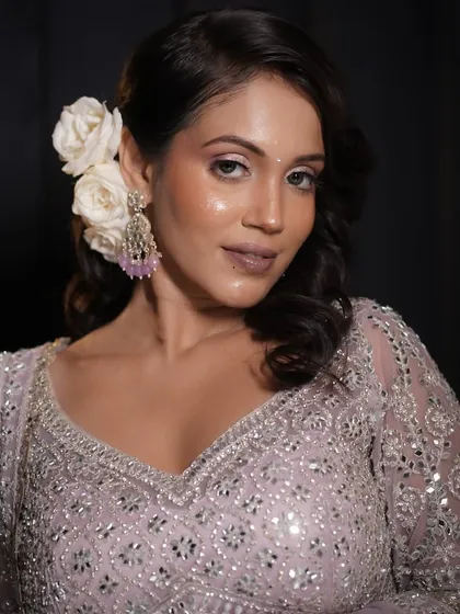 A close-up of the final glass skin look. Notice the highlights on the high points of the face, creating a multi-dimensional and radiant effect.