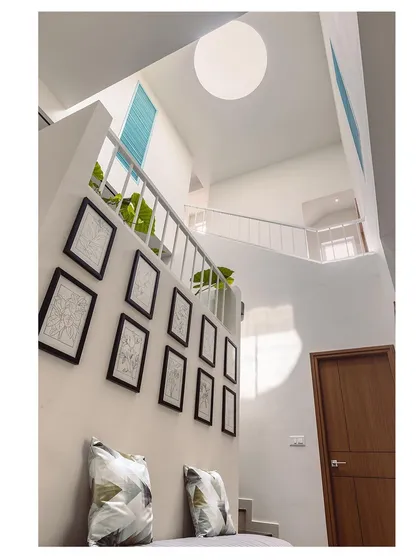 An identical shot of the bright and airy staircase, highlighting the architectural design and the flow of natural light through the home.