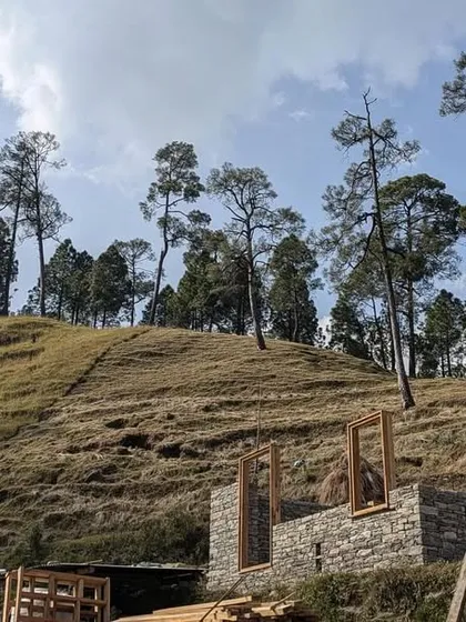 A view of the Himalayan landscape where our guesthouses are being constructed. The project is carefully sited on agricultural terraces, or 'khets', to minimize disruption to the natural contours of the land.