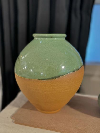 A few of my favorite finished vases from a recent collection, featuring a variety of glazes, painted details, and forms. Each one has its own personality.