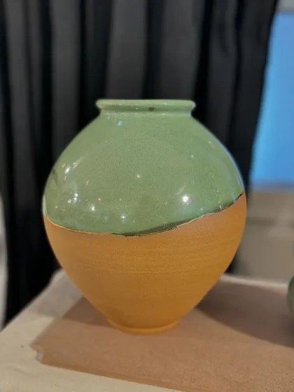 A few of my favorite finished vases from a recent collection, featuring a variety of glazes, painted details, and forms. Each one has its own personality.