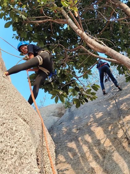 Two climbers on the wall during our anchoring workshop, practicing skills in a controlled environment.