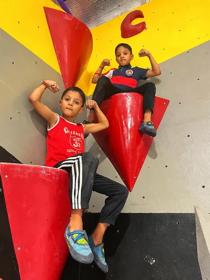 This picture says it all. I help kids build confidence and strength they never knew they had. Seeing them reach the top and feel like superheroes is the best part of my job.