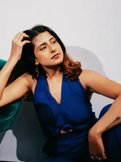 A thoughtful pose from a photoshoot.