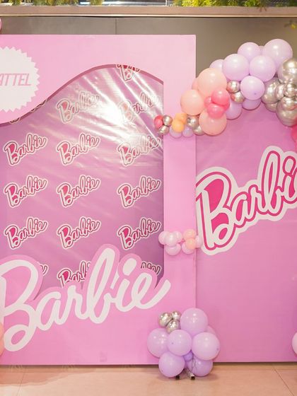 Come on Barbie, let's go party. Our life-sized Barbie box photo booth is a highlight of our Barbie-themed celebrations, providing a fun and iconic photo opportunity.