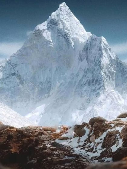 The sharp, icy peak of a Himalayan giant seen on the Everest Base Camp trek. I ensure all safety measures and permits are handled for this moderate-difficulty trek.
