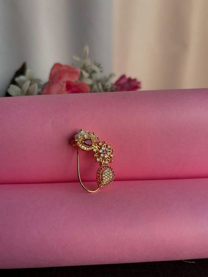 A beautiful American Diamond nath with a unique floral and teardrop design.