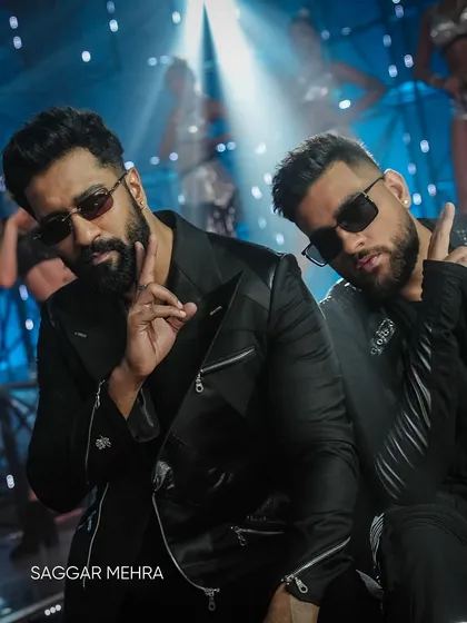 On the set of the "Tauba Tauba" music video with Vicky Kaushal. My designs for this project were focused on creating a strong, modern aesthetic with bespoke pieces like this structured biker jacket.