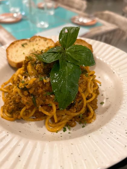 The spaghetti bolognese at Rose Cafe is like a warm hug in a bowl. I wanted to capture that comforting, hearty feeling in this close up shot.