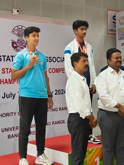 Satvik on the podium after his gold medal win in the 25m Standard Pistol event at the Karnataka State Shooting Competition 2024.