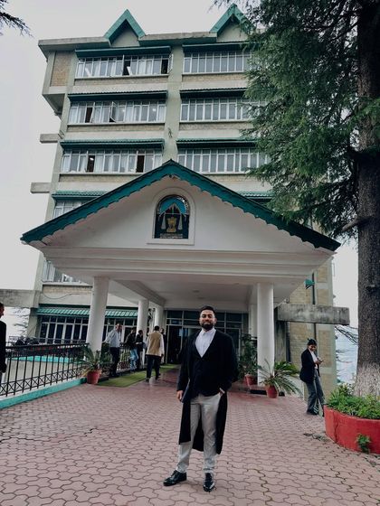 In my professional attire outside the High Court of Himachal Pradesh. Every court appearance is both a responsibility and a privilege.