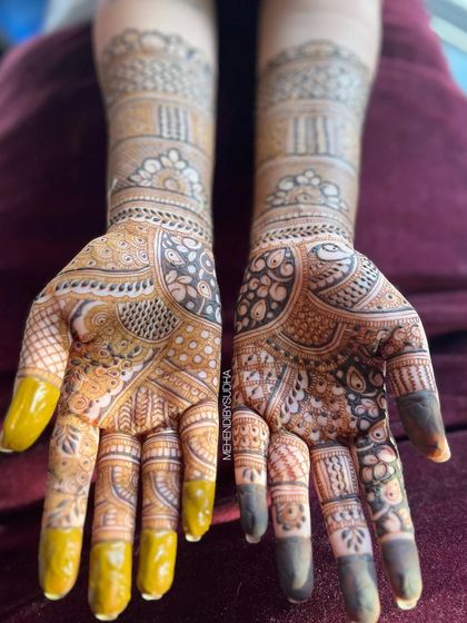 A close-up showing the rich texture and color of the henna, a testament to the quality of the natural paste I use.