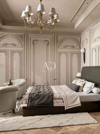 I designed this retreat to reflect opulence and luxury with exquisite detailing. The tall, channel-tufted headboard in dark leather makes a bold statement against the intricately paneled walls.