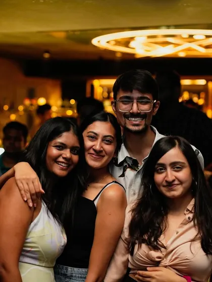 A happy group of friends enjoying the start of their weekend at Flo.