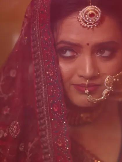 Crafting a dreamy, traditional bridal look for a beautiful bride in Varanasi. The focus here was on creating a soft, romantic feel with dramatic eyes that shine through the veil.