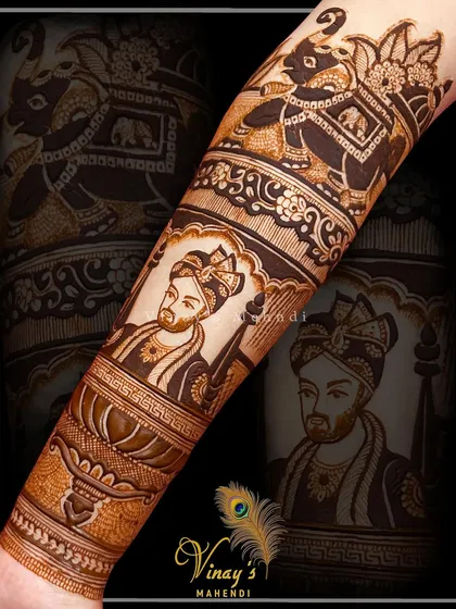 A detailed groom portrait on the forearm, complete with intricate turban details and traditional attire. This is a great example of the character work we practice in our portrait masterclass.