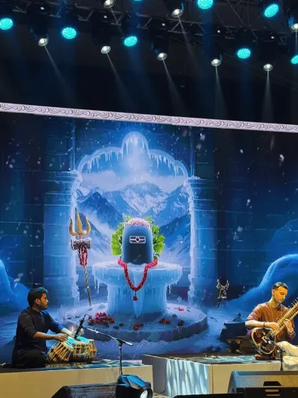 A stunning visual from our performance in Kolkata with Rishabh Sharma bhai. The backdrop of the icy Shivling created a divine atmosphere.