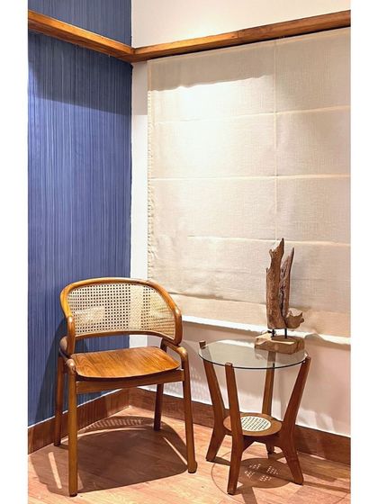 My 'Romaji' chair and 'Tipoy' side table creating a stylish corner. The beauty of teak furniture is how it can transform any space.