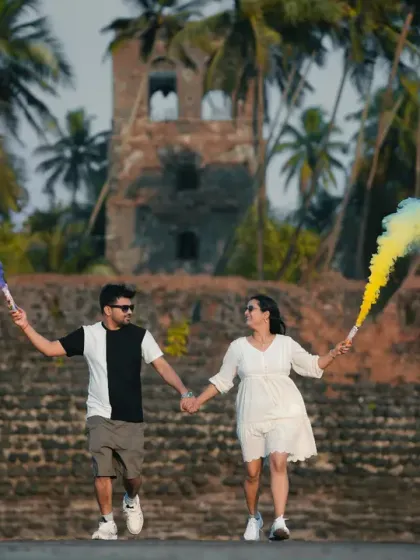 A fun and colorful pre-wedding moment using smoke bombs at an Alibaug fort. We bring creative props to add a vibrant and dynamic element to your photoshoot.