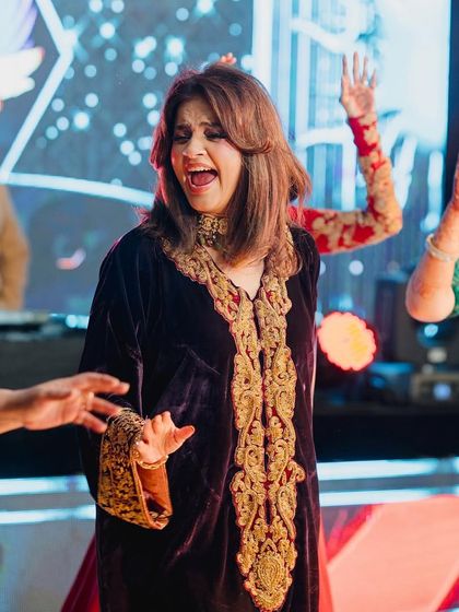 A candid moment of pure joy from a family performance. This is what it's all about!