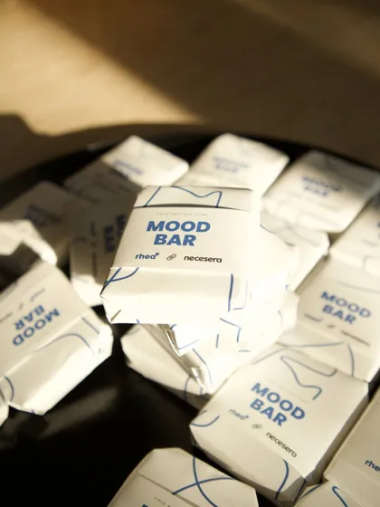 The 'Mood Bar' soaps catching the light, showcasing their clean and modern packaging.