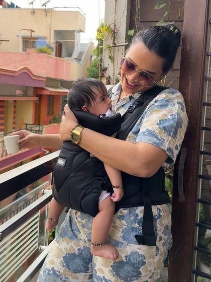 A candid moment from the LittleBum baby carrier shoot. This image captures the loving bond between mother and child, subtly reinforcing the product's benefit of keeping the baby close while you go about your day.