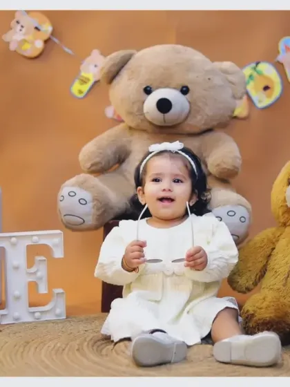 A cozy and cute first birthday shoot with a teddy bear theme. The warm tones and soft textures create a comforting and adorable setting for your child's portraits.