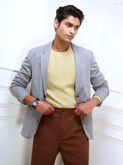 A three-quarter length shot for a male model's portfolio. This type of image is essential as it shows the model's physique and how he carries himself in clothing.