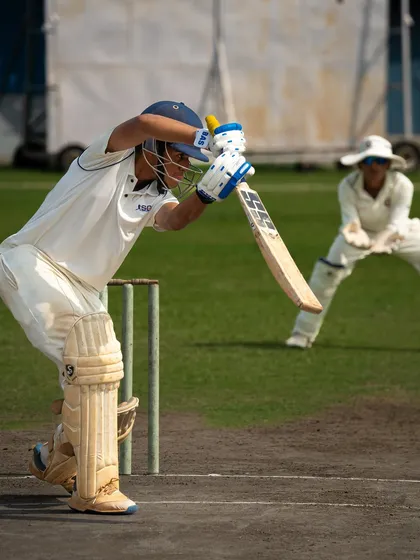 A powerful drive through the off-side. This action shot captures the perfect blend of timing and technique that we focus on in our batting sessions.