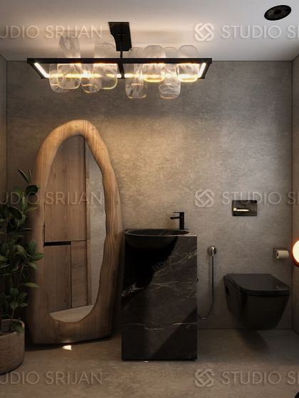 Another angle of the Harsh Vihar powder room, showing the interplay of textures between the concrete-finish walls, the raw wood mirror, and the smooth, black marble sink.