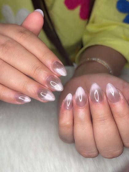 A close-up of the brown cat eye nails, showing the magnetic shimmer.