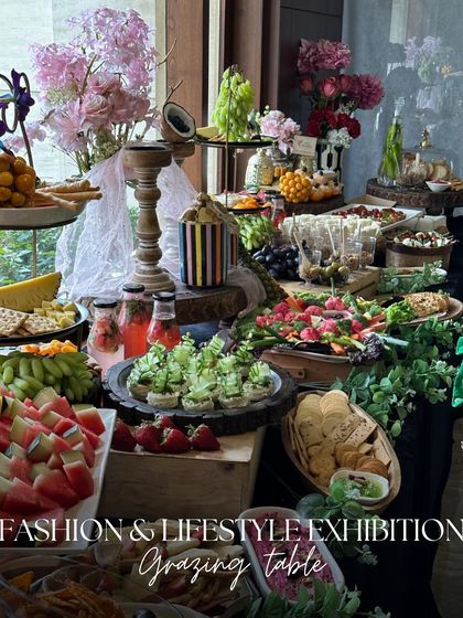 For a fashion and lifestyle exhibition, we designed a grazing table that was as chic as the event itself. The spread included fresh strawberries, watermelon, and light bites like mini tarts and caprese skewers.