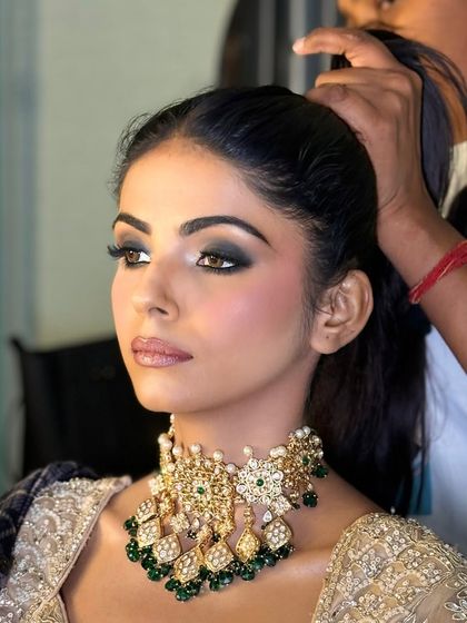 A clean, unedited shot of a classic smokey eye. Notice how the skin still has a natural texture and sheen. This is the kind of camera-ready makeup I specialize in.