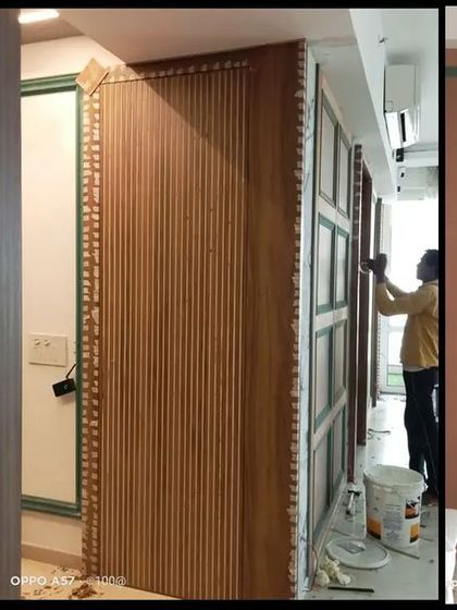 Our team at work, executing the intricate paneling and finishing touches that bring the design concept to life.