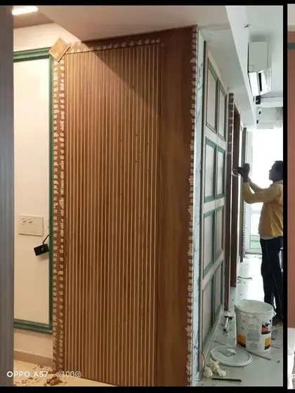 Our team at work, executing the intricate paneling and finishing touches that bring the design concept to life.