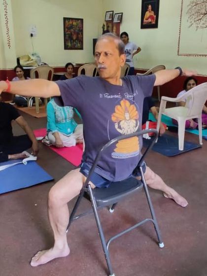 A seated pose on a chair.
