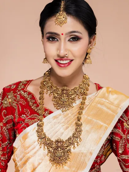 A classic South Indian bridal portrait, showcasing intricate traditional jewellery and attire. I focus on capturing the grace and joy of the moment in my bridal photoshoots.